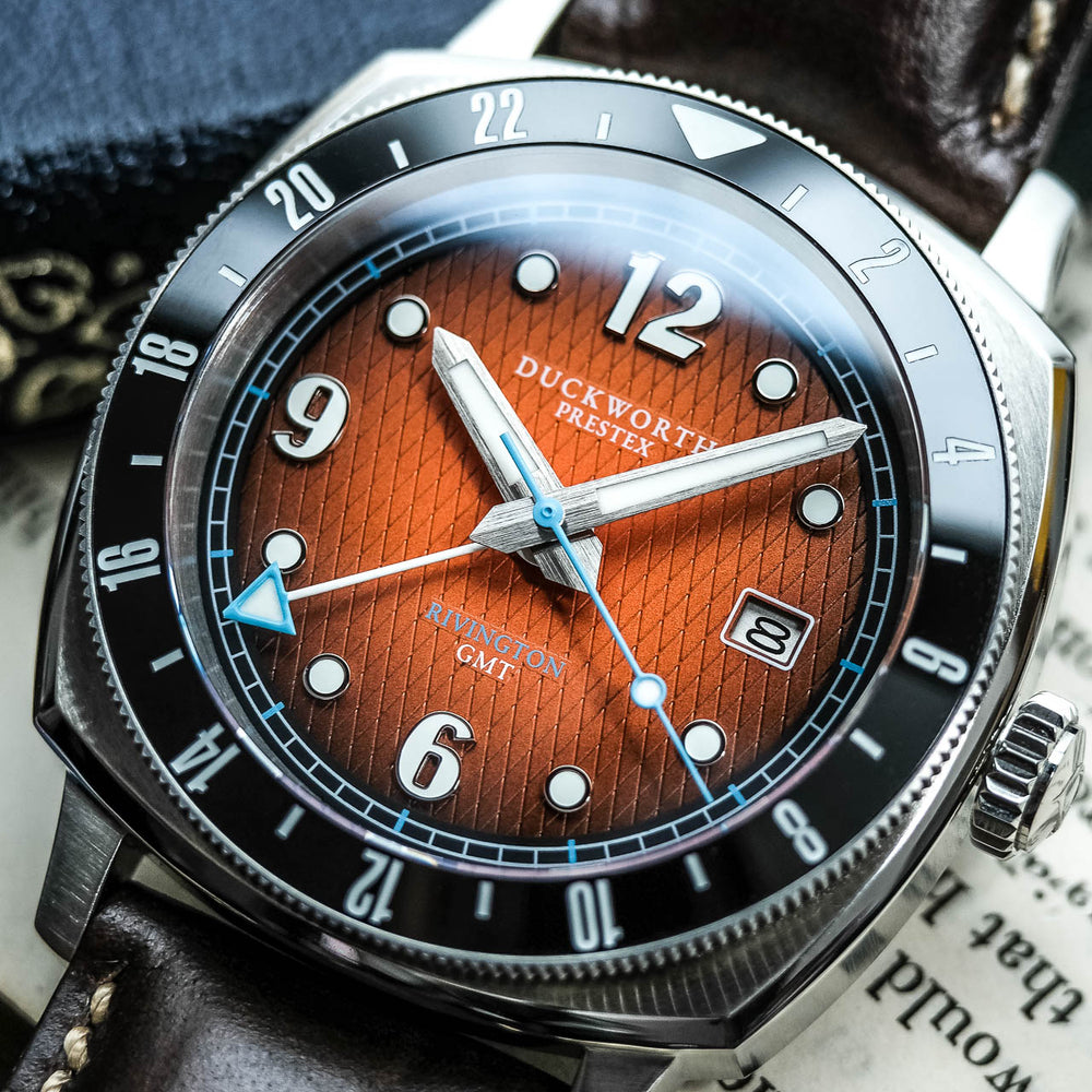 
                  
                    Rivington GMT watch orange dial on brown leather
                  
                