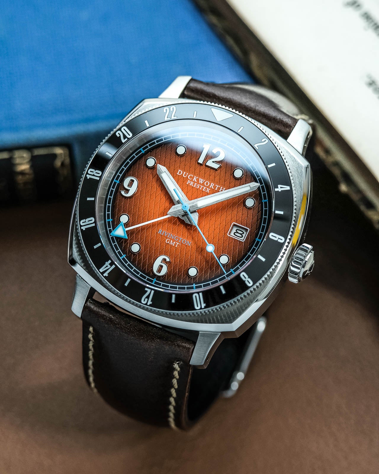 
                  
                    Rivington GMT watch orange dial on brown leather
                  
                